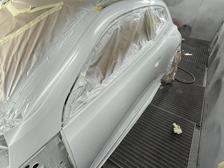 Car masked up in the spray booth ready for respray